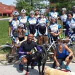 ActioNeter David Poses with his Bicycling Team