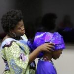 ActioNeters Show how to Tie a Gele at Health Services Cultural Day