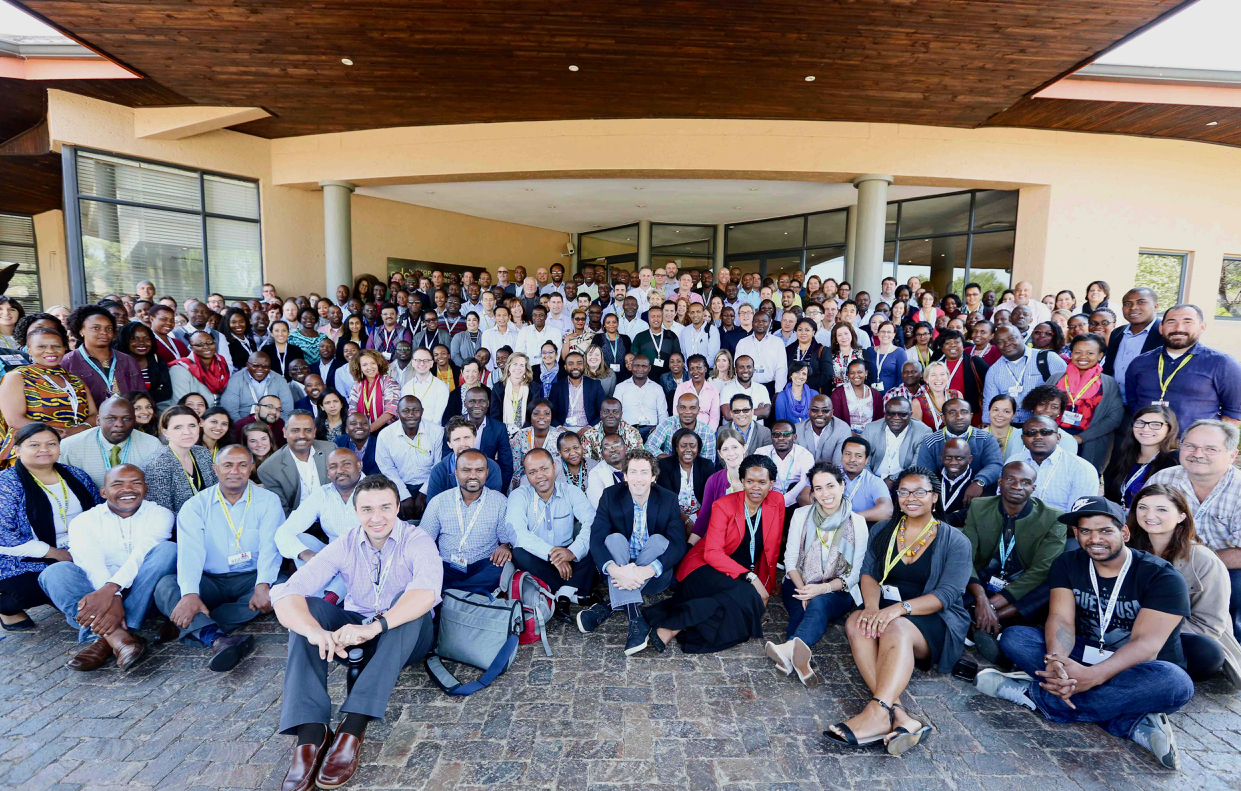 Attendees to the PEPFAR Data and Systems Applied Learning Summit pose for a photo together