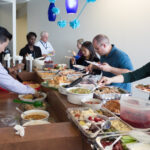 ActioNeters Enjoy Thanksgiving Potluck