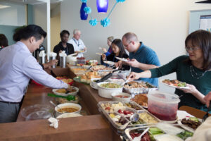 ActioNeters Share and Enjoy Food at the ActioNet Thanksgiving Potluck