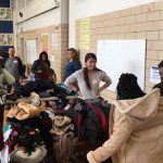 ActioNeters giving Coats to Charity