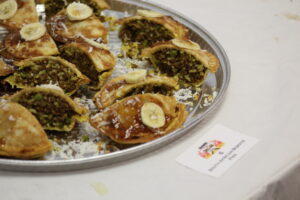 Dishes displayed along the competition table for all to see and eat