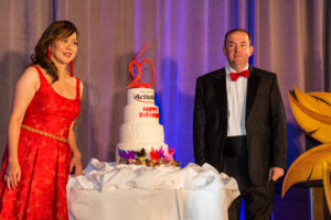 Founder Ashley Chen and CAO Jeff Abish cut the 20th anniversary cake