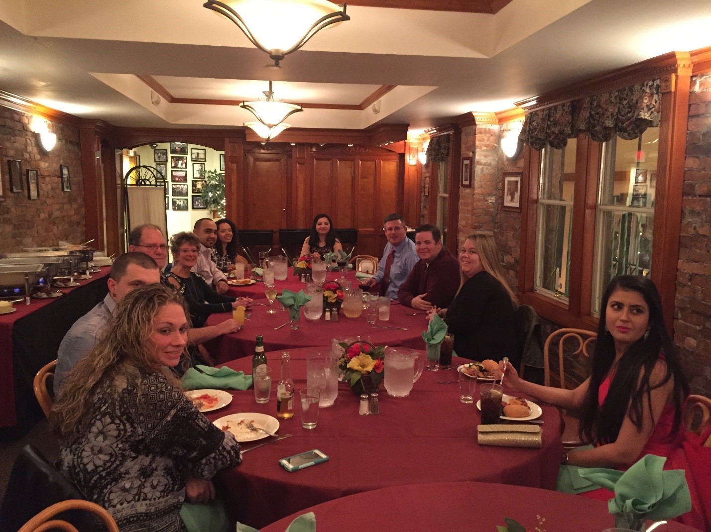 ActioNet employees together enjoying holiday dinner