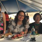 Grace and Family eat with Ashley