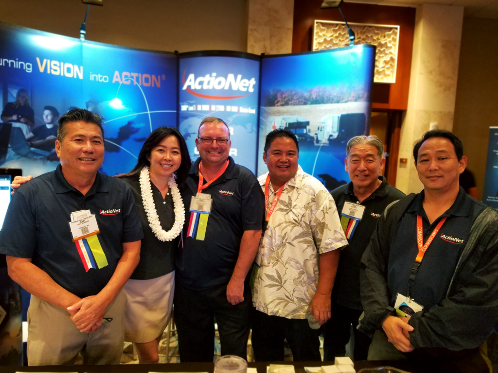 ActioNeters Pose in Front of the ActioNet Booth at TechNet Indo-Pacific