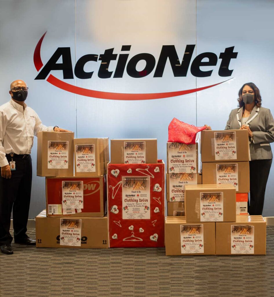 ActioNeters Michelle and Mengie wore masks while boxing clothing donations to the American Red Cross