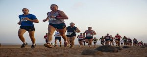 Runners participating in a race in the desert